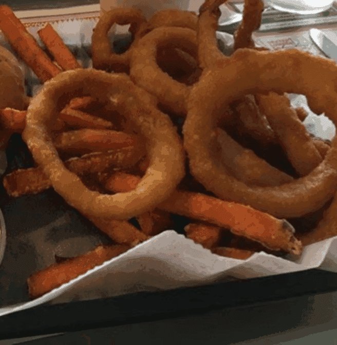 Printed menu with seafood baskets and sandwiches.