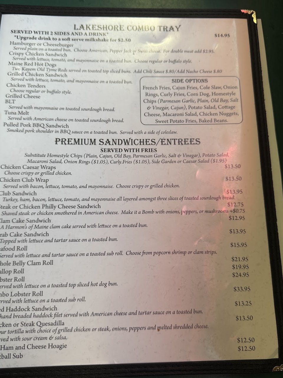 Printed menu with seafood baskets and sandwiches.